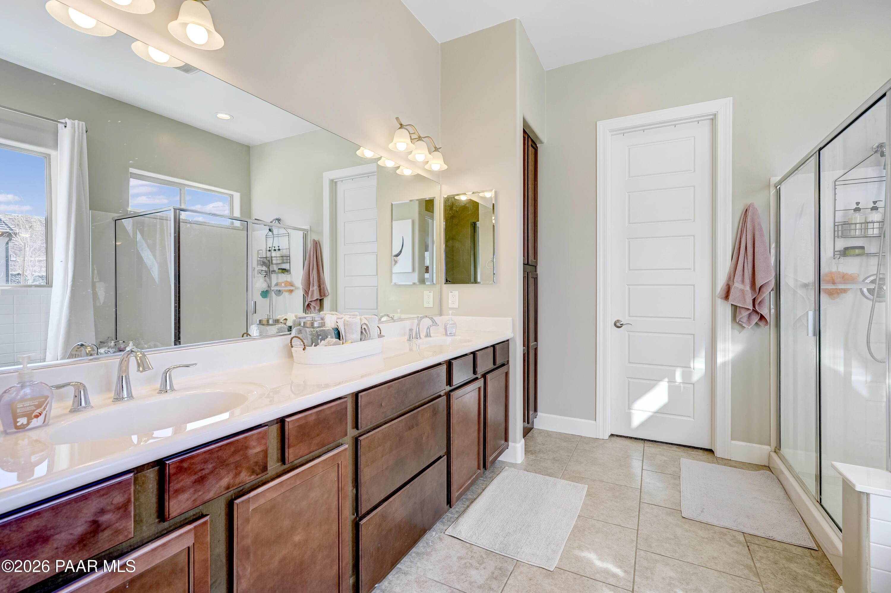 2032 Summer View Drive Prescott, AZ 86301 - Photo 7 of 17 a bathroom with a double vanity sink and a mirror