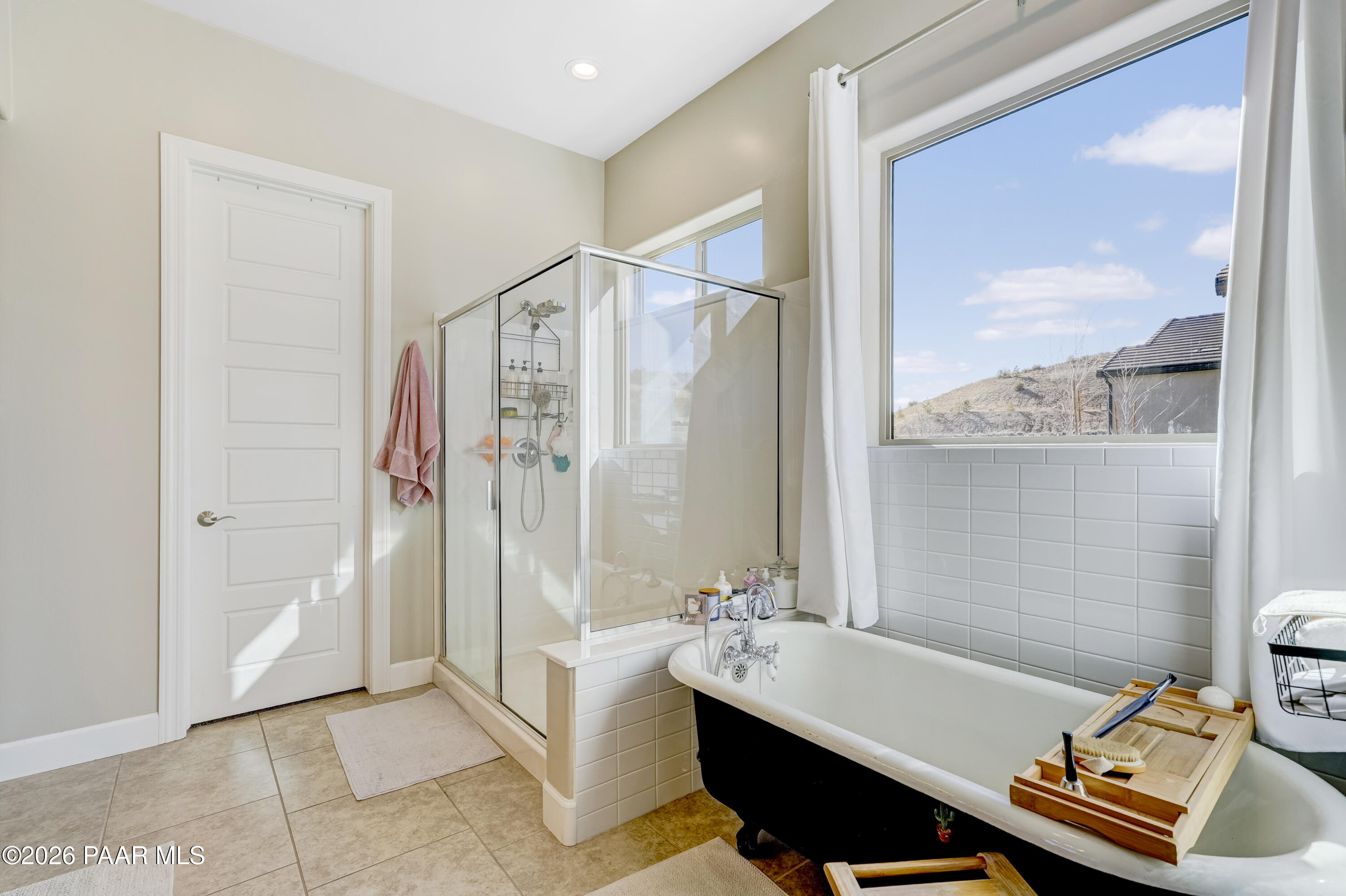 2032 Summer View Drive Prescott, AZ 86301 - Photo 8 of 17 a bathroom with a tub and shower