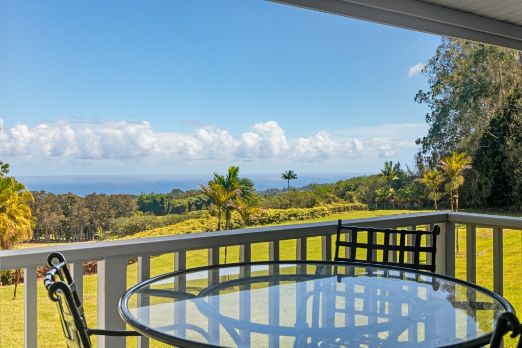 29-655 Chin Chuck Road Hakalau, HI 96781 - Photo 14 of 30 a view of a balcony with an ocean