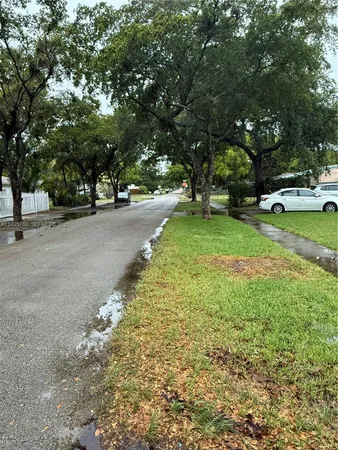 a view of a street with houses
