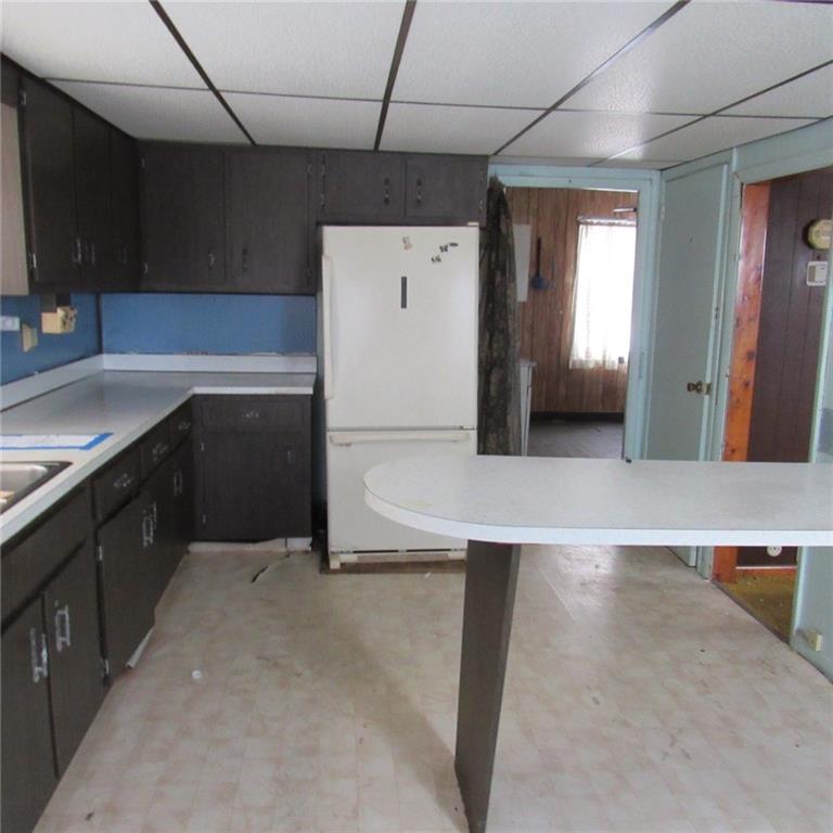 290 Foxburg Road Normalville, PA 15469 - Photo 7 of 19 a kitchen with a sink and cabinets