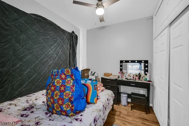 a bedroom with a bed and a walk in closet