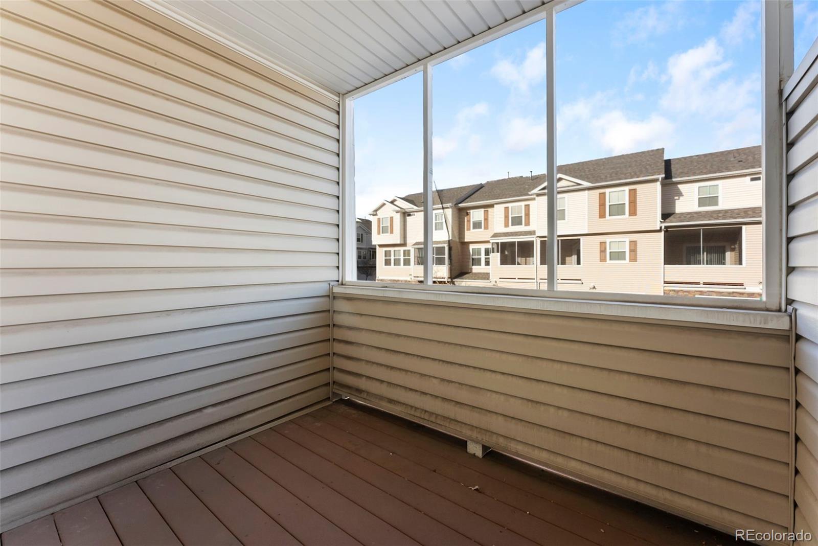 2020 Squawbush Ridge Grove Colorado Springs, CO 80910 - Photo 20 of 29 a view of a back yard from a balcony