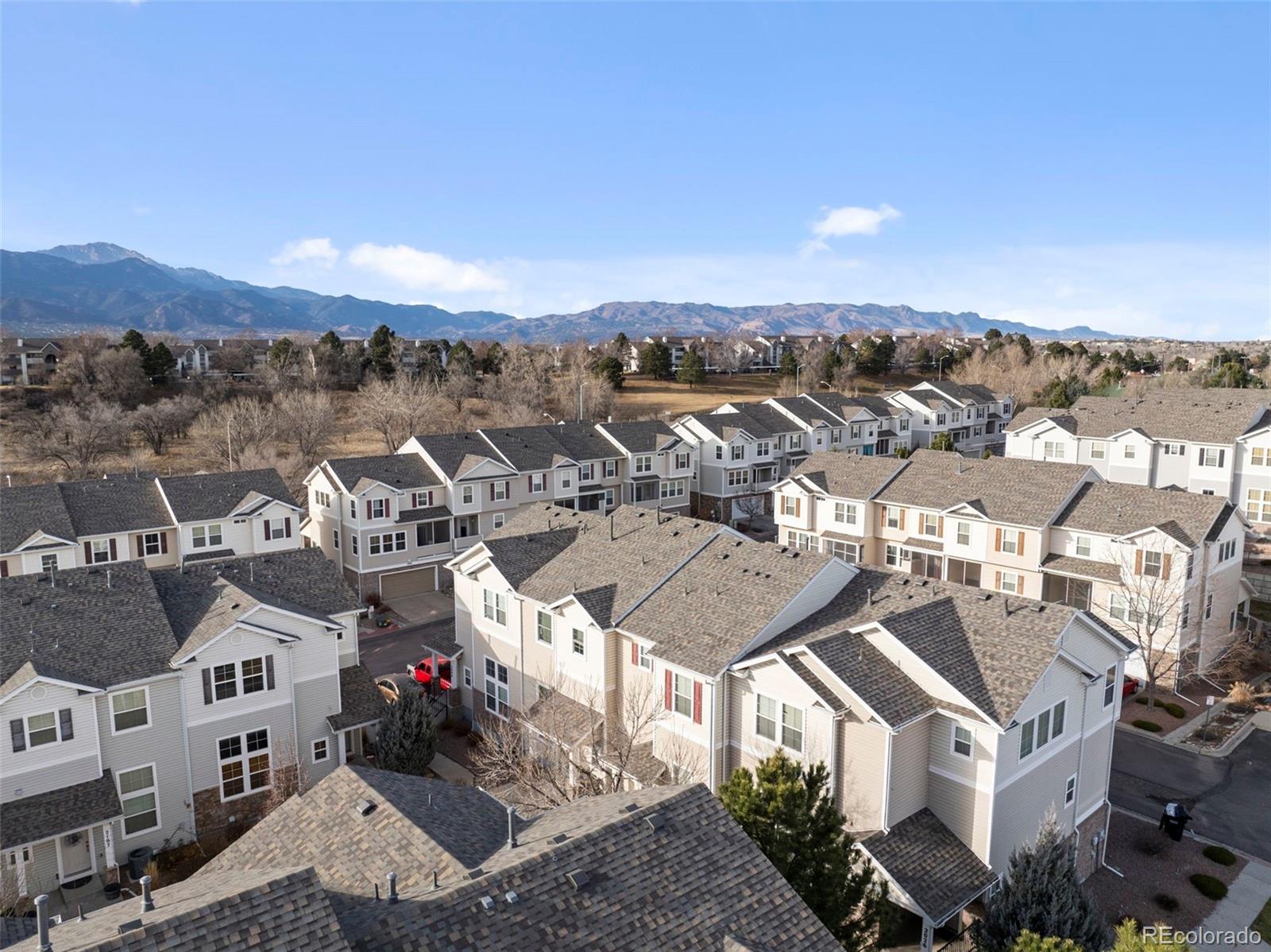 2020 Squawbush Ridge Grove Colorado Springs, CO 80910 - Photo 21 of 29 an aerial view of residential houses with outdoor space
