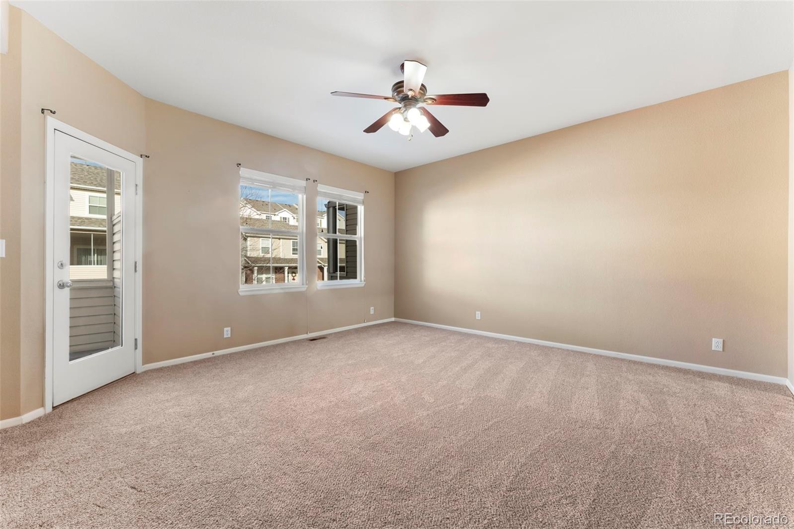 2020 Squawbush Ridge Grove Colorado Springs, CO 80910 - Photo 5 of 29 a view of an empty room with a window