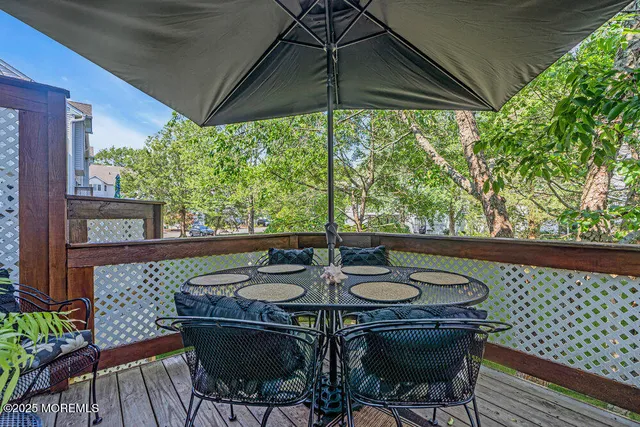 a view of an outdoor sitting area with furniture