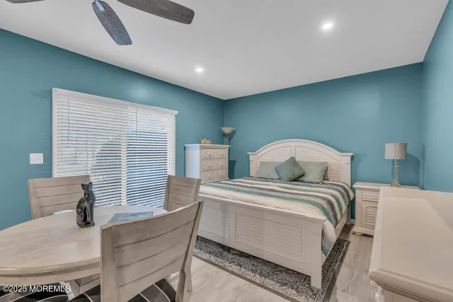 a bedroom with furniture and windows