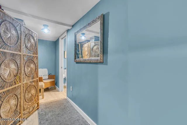 a view of a hallway with couch