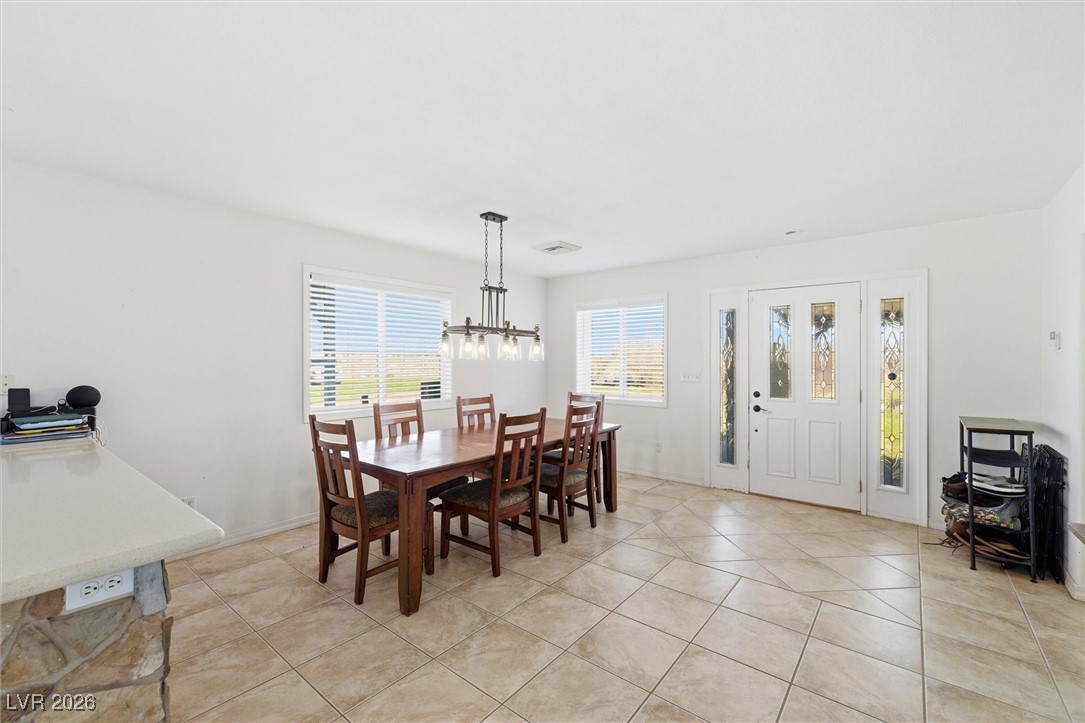 2570 East Kellogg Road Pahrump, NV 89048 - Photo 16 of 60 Large dining area with outside access