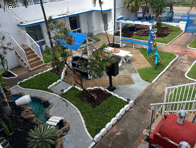 a view of street with sitting area