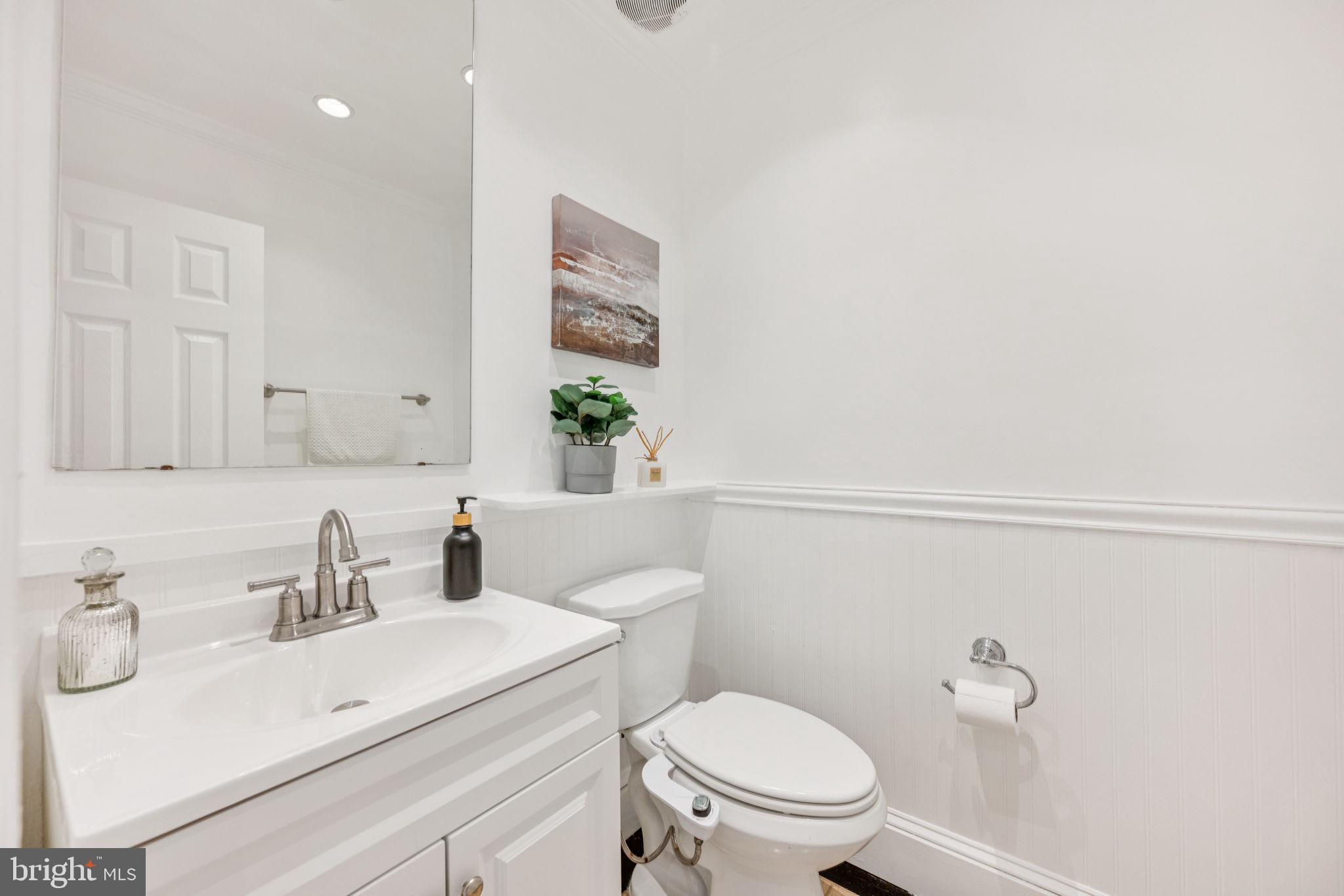 10600 Vantage Court Potomac, MD 20854 - Photo 12 of 51 a bathroom with a sink a toilet and vanity