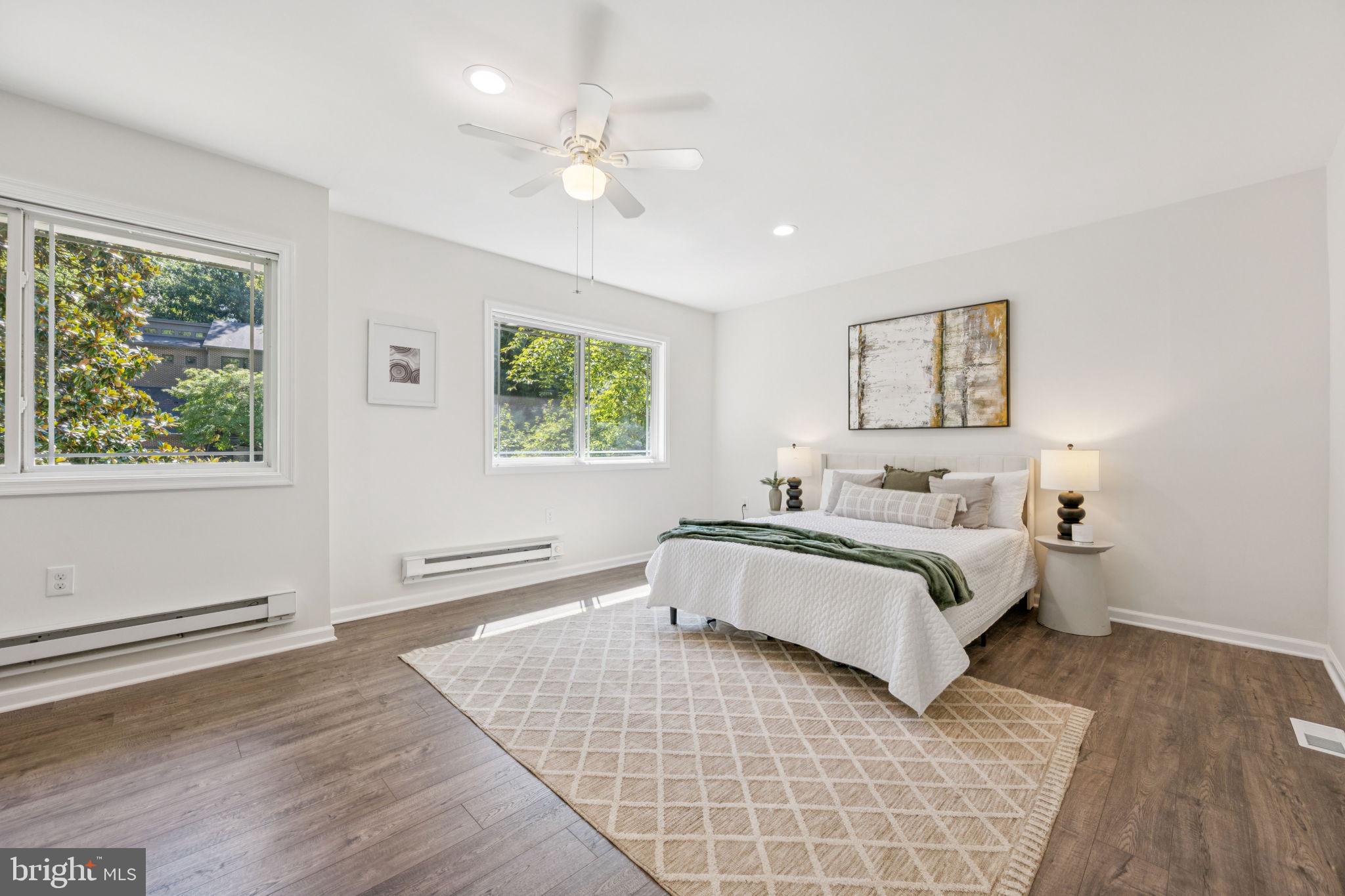 10600 Vantage Court Potomac, MD 20854 - Photo 14 of 51 a bedroom with a large bed and a window