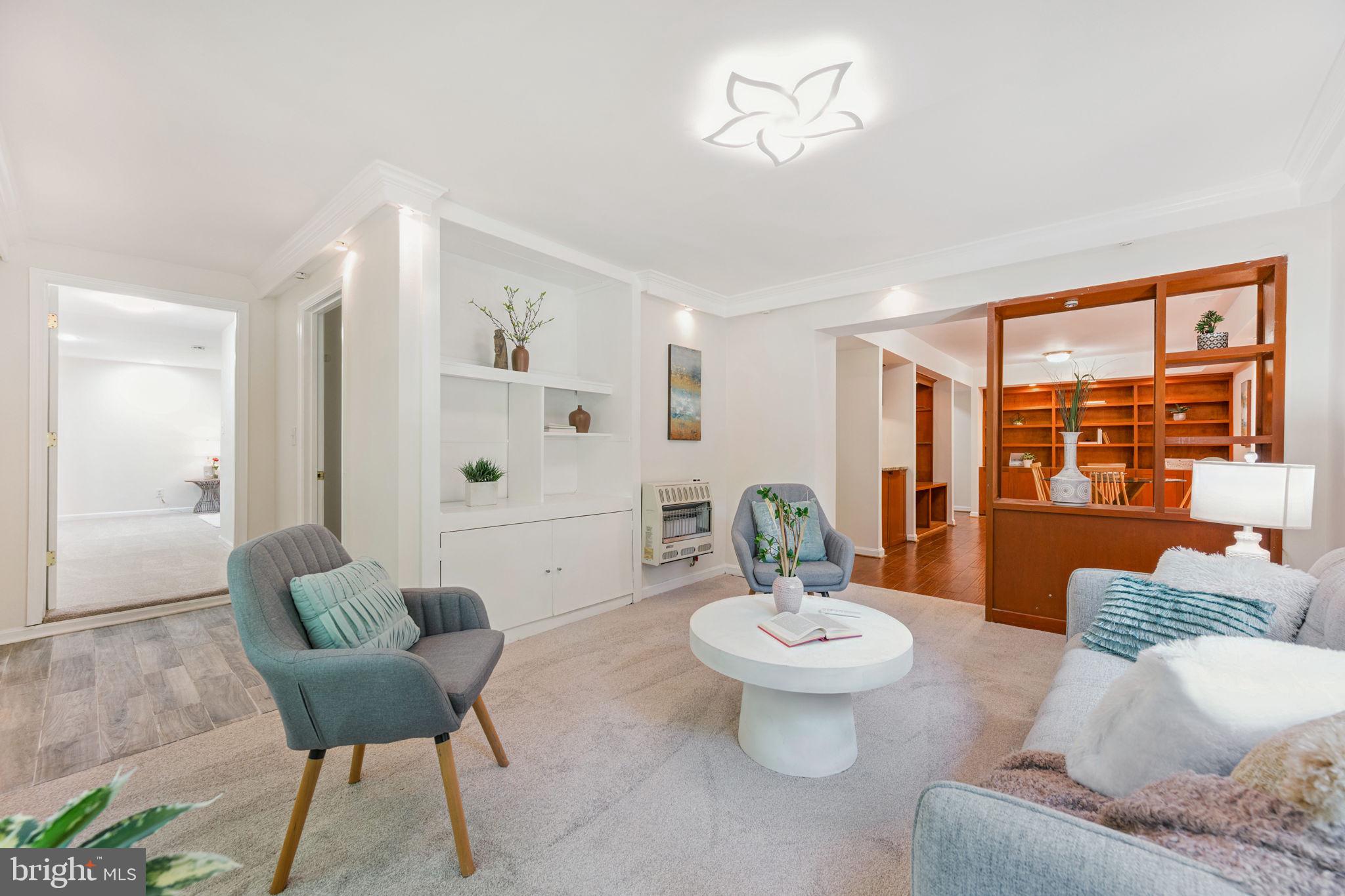 10600 Vantage Court Potomac, MD 20854 - Photo 27 of 51 a living room with furniture and a large window