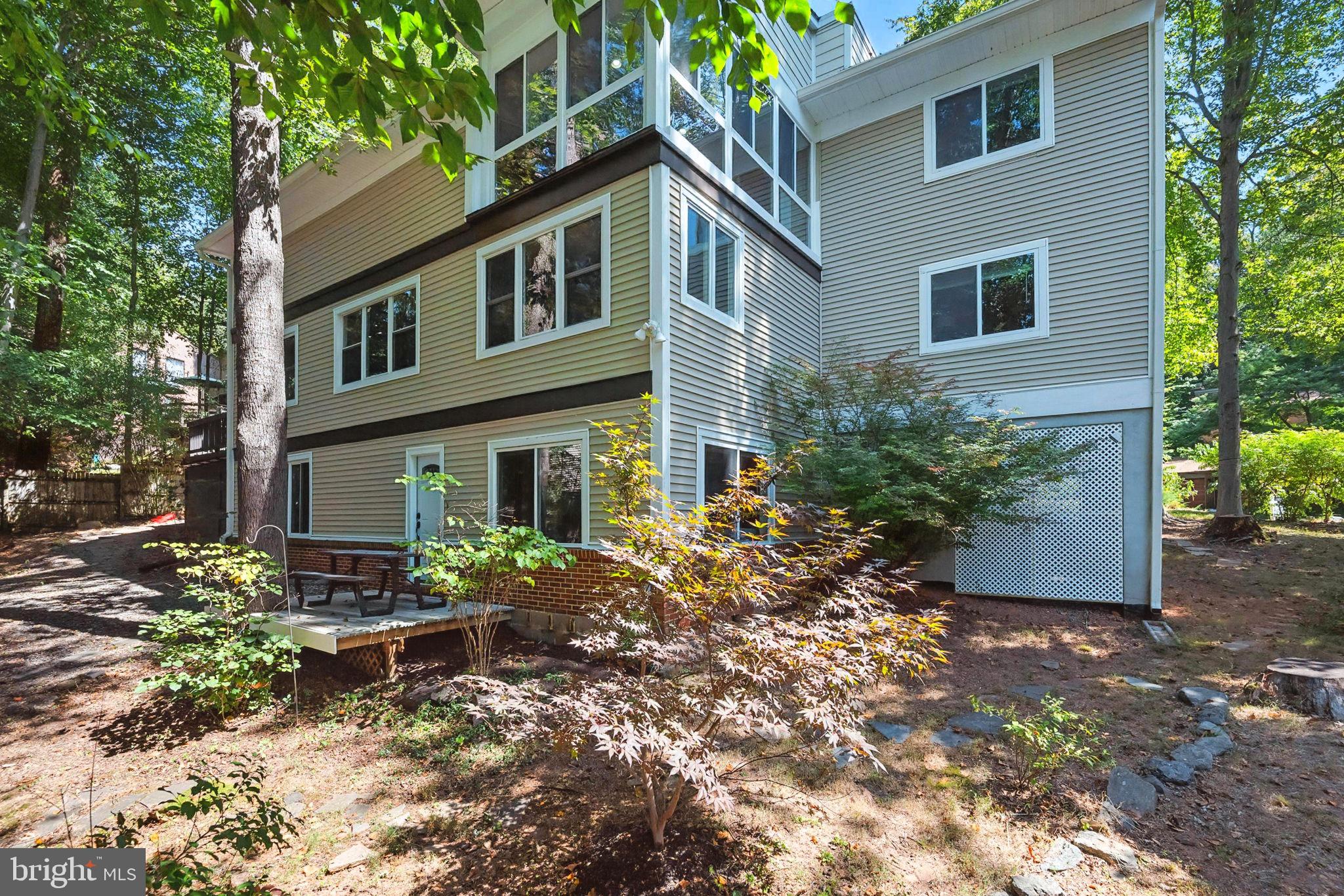10600 Vantage Court Potomac, MD 20854 - Photo 33 of 51 a front view of a house with garden