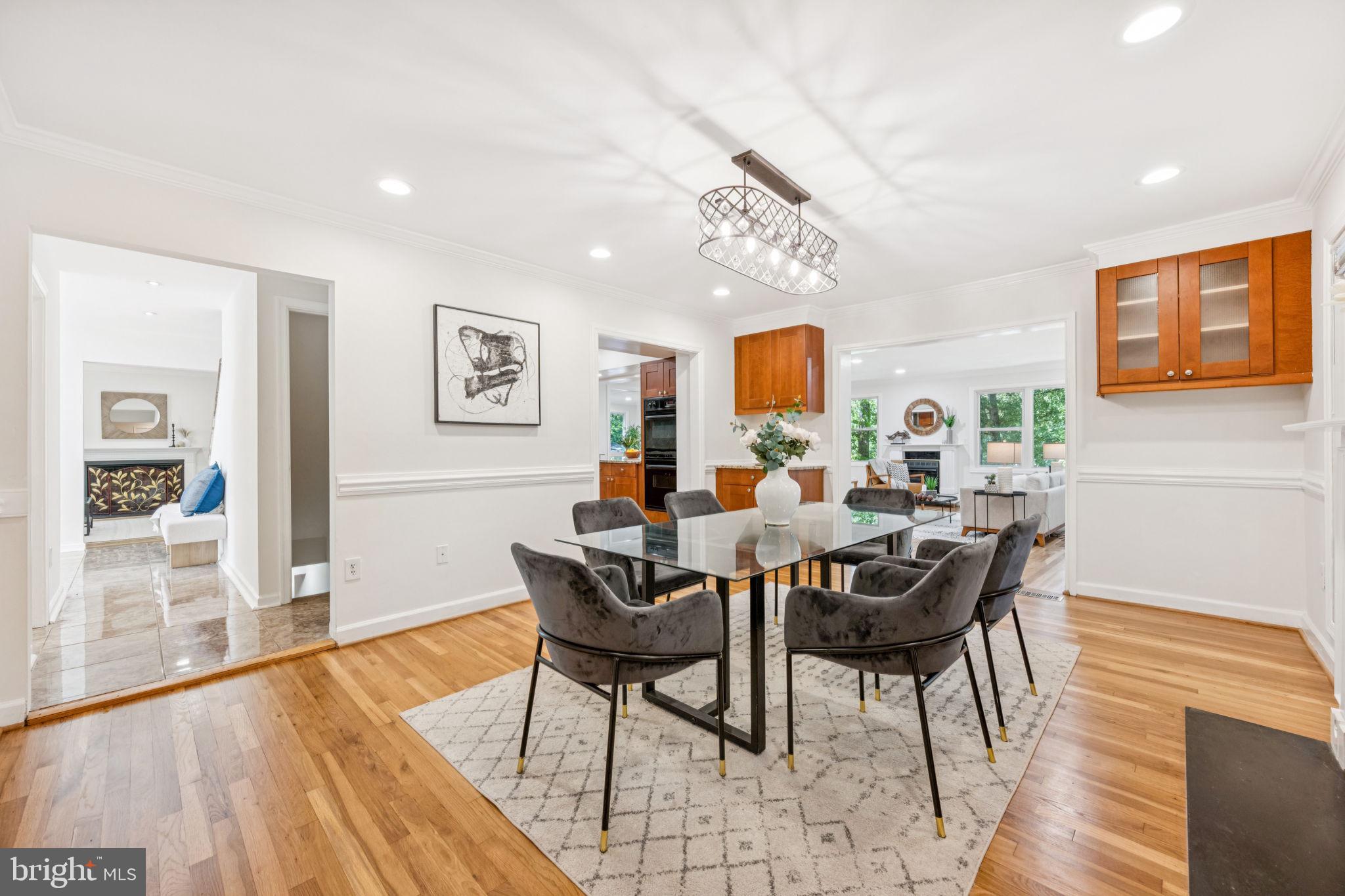 10600 Vantage Court Potomac, MD 20854 - Photo 10 of 51 a view of a dining room with furniture and wooden floor