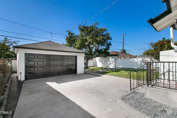 a view of a house with a garage