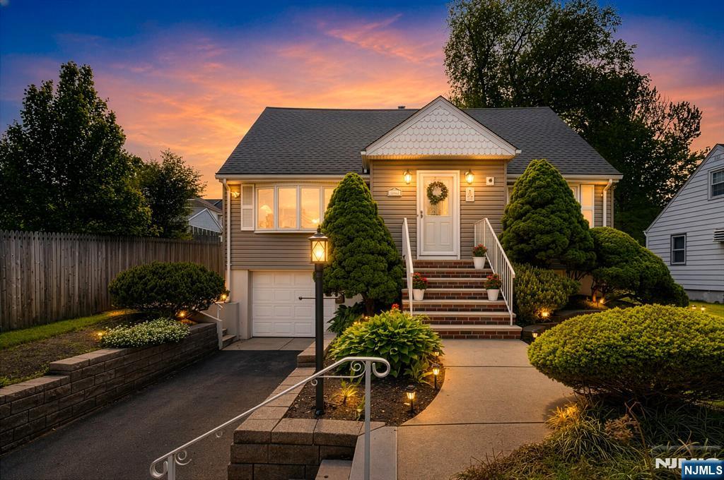 287 Jackson Avenue Rutherford, NJ 07070 - Photo 1 of 36 a front view of a house with garden
