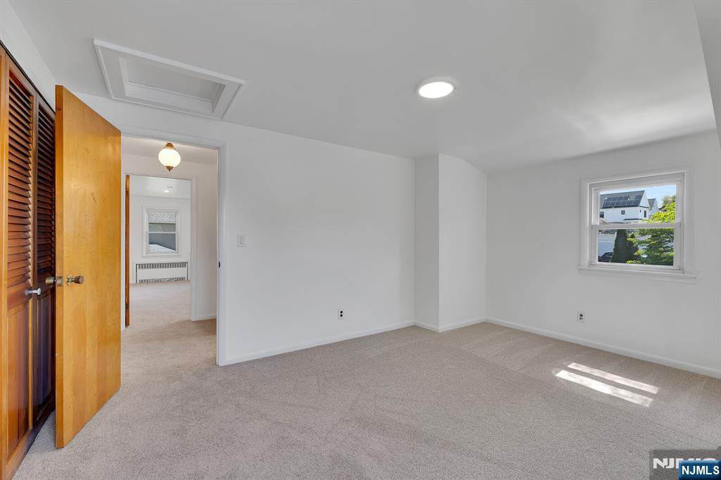 287 Jackson Avenue Rutherford, NJ 07070 - Photo 24 of 36 wooden floor and windows in a room