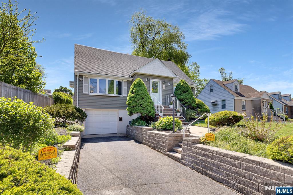 287 Jackson Avenue Rutherford, NJ 07070 - Photo 31 of 36 front view of house with a yard