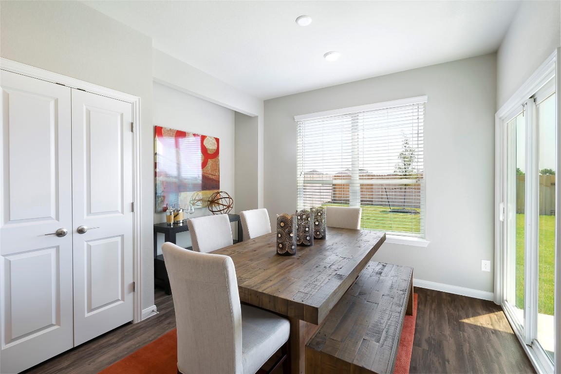 104 Arches Way Georgetown, TX 78626 - Photo 1 of 10 a dining room with furniture and wooden floor