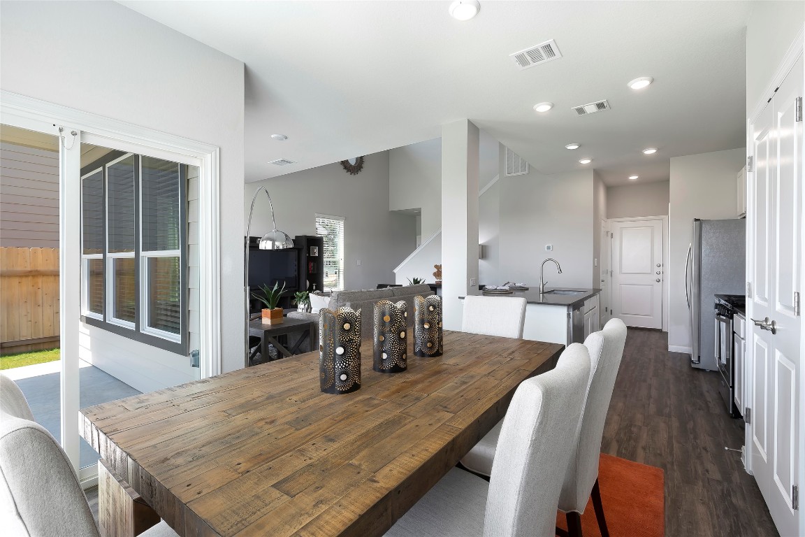 104 Arches Way Georgetown, TX 78626 - Photo 2 of 10 a dining room with furniture and wooden floor