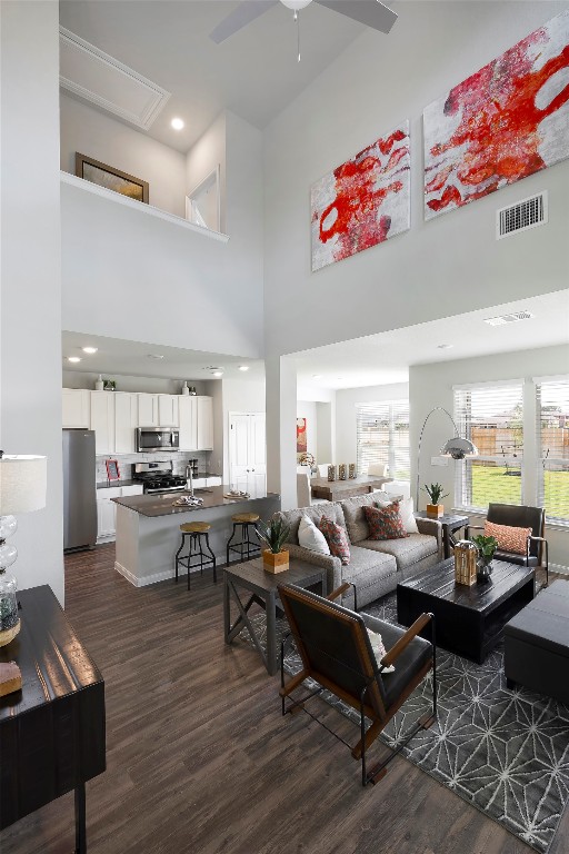 104 Arches Way Georgetown, TX 78626 - Photo 5 of 10 a living room with fireplace furniture and a wooden floor