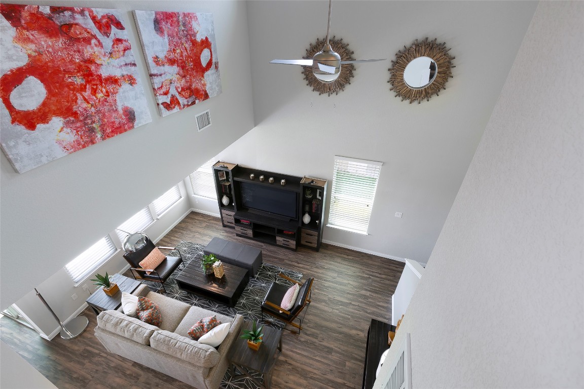104 Arches Way Georgetown, TX 78626 - Photo 8 of 10 a living room with furniture and a dining table