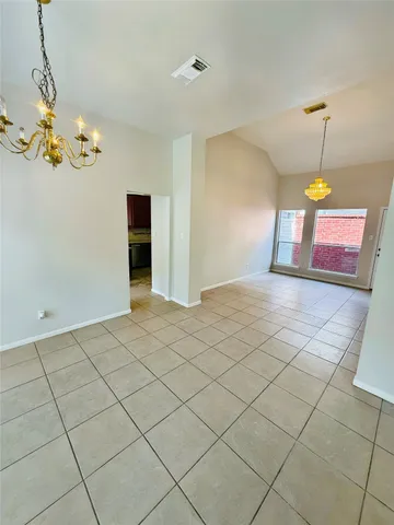 a view of a room with a chandelier
