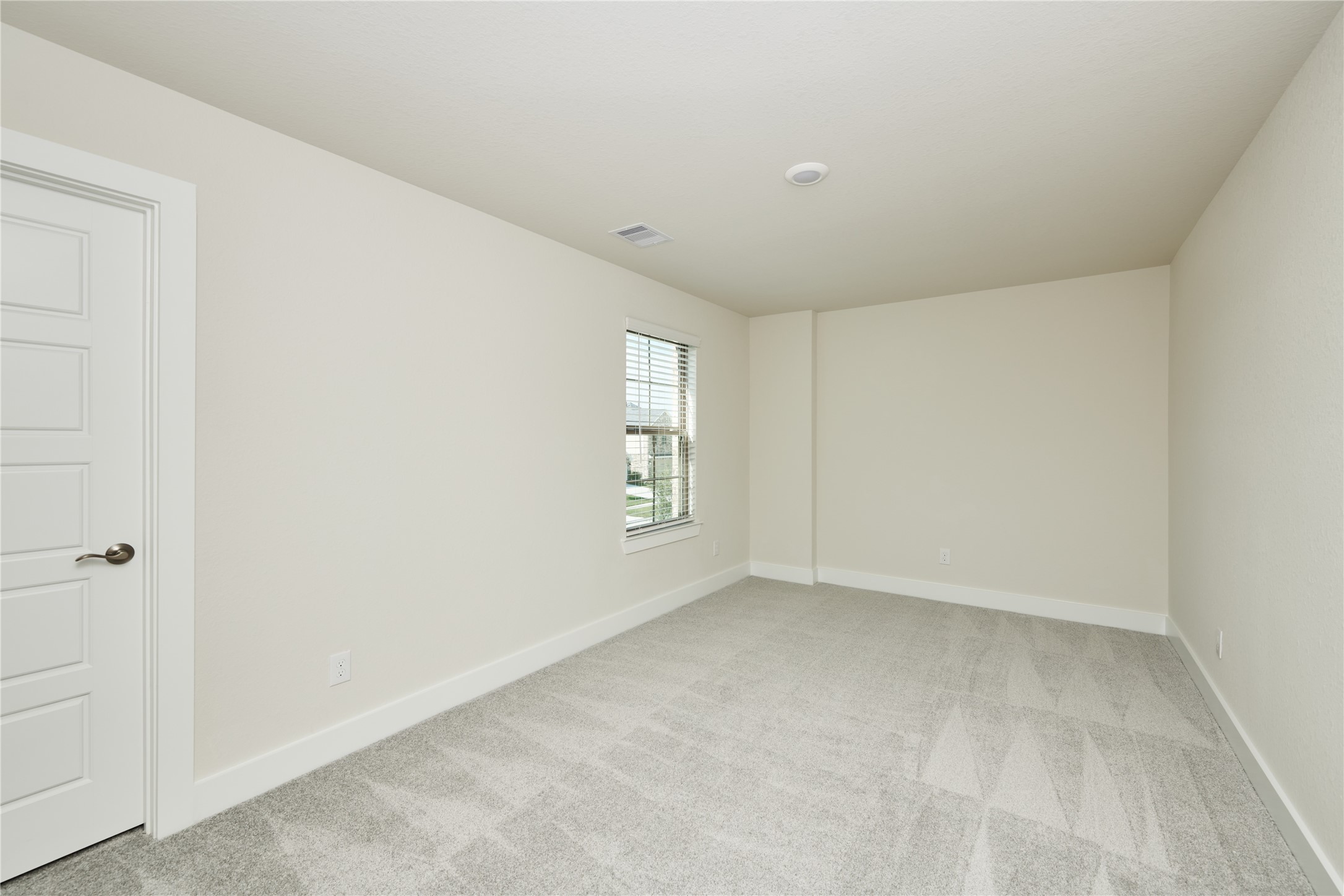 10647 Whitejacket Conroe, TX 77385 - Photo 27 of 38 a view of an empty room with a window