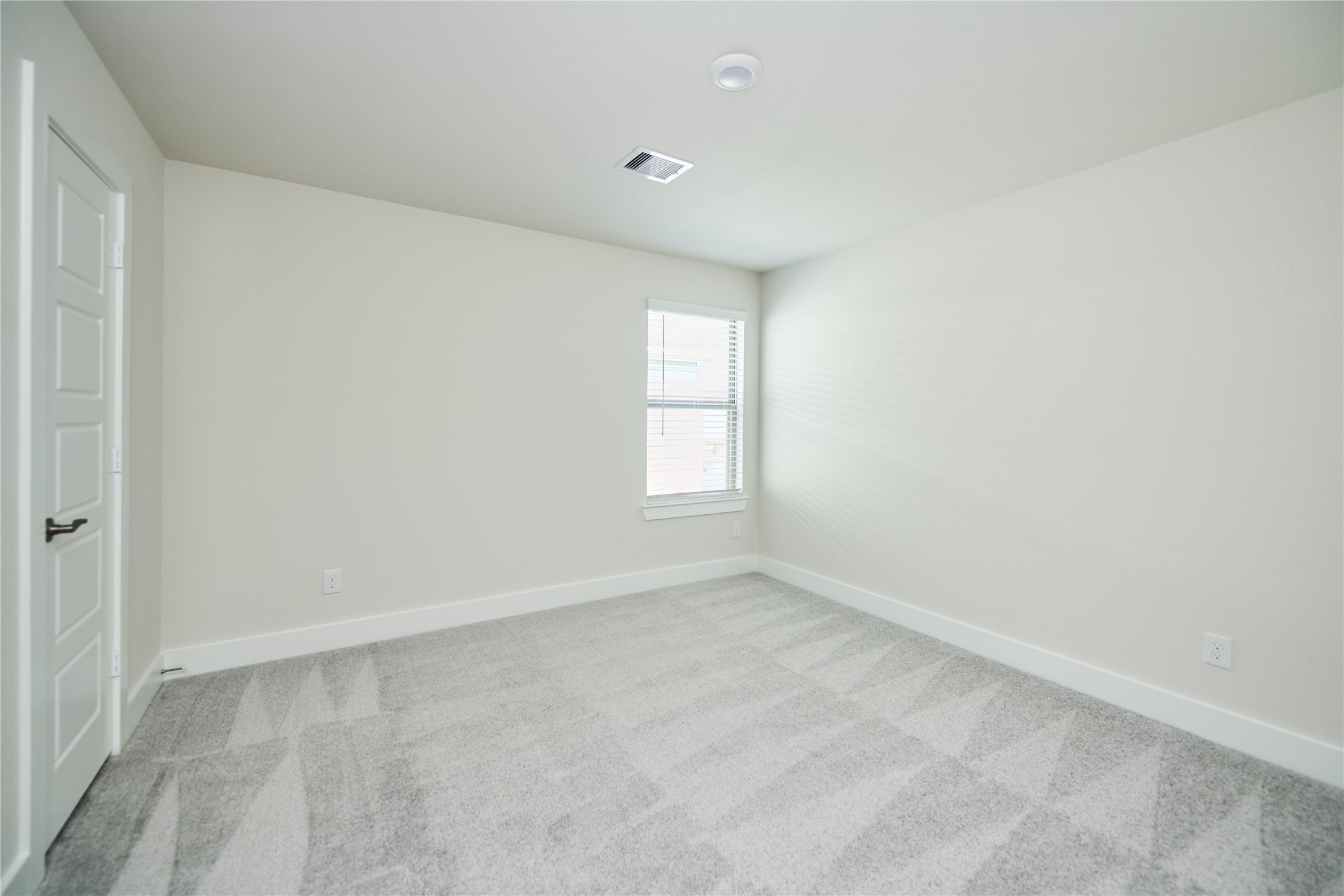 10647 Whitejacket Conroe, TX 77385 - Photo 31 of 38 an empty room with a window