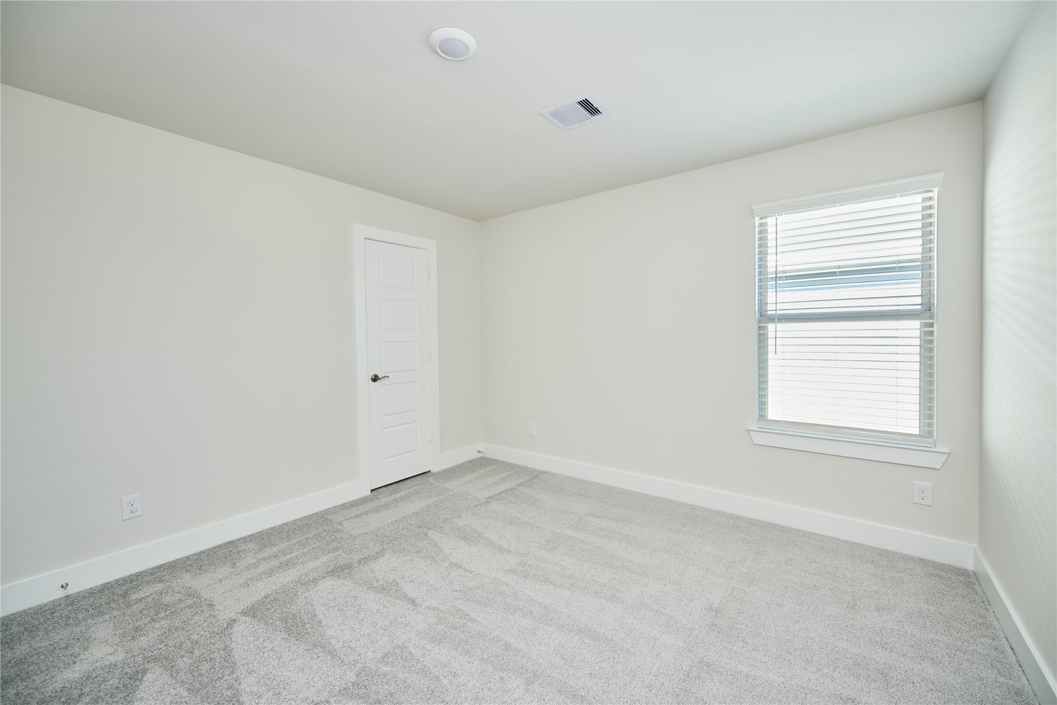 10647 Whitejacket Conroe, TX 77385 - Photo 32 of 38 an empty room with a window