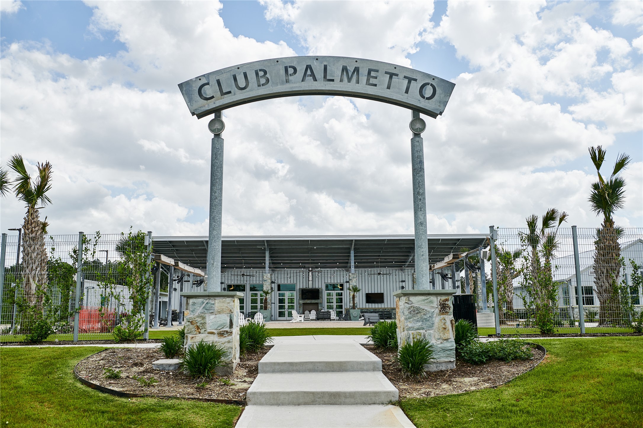 10647 Whitejacket Conroe, TX 77385 - Photo 35 of 38 a view of a swimming pool and a fountain in the background