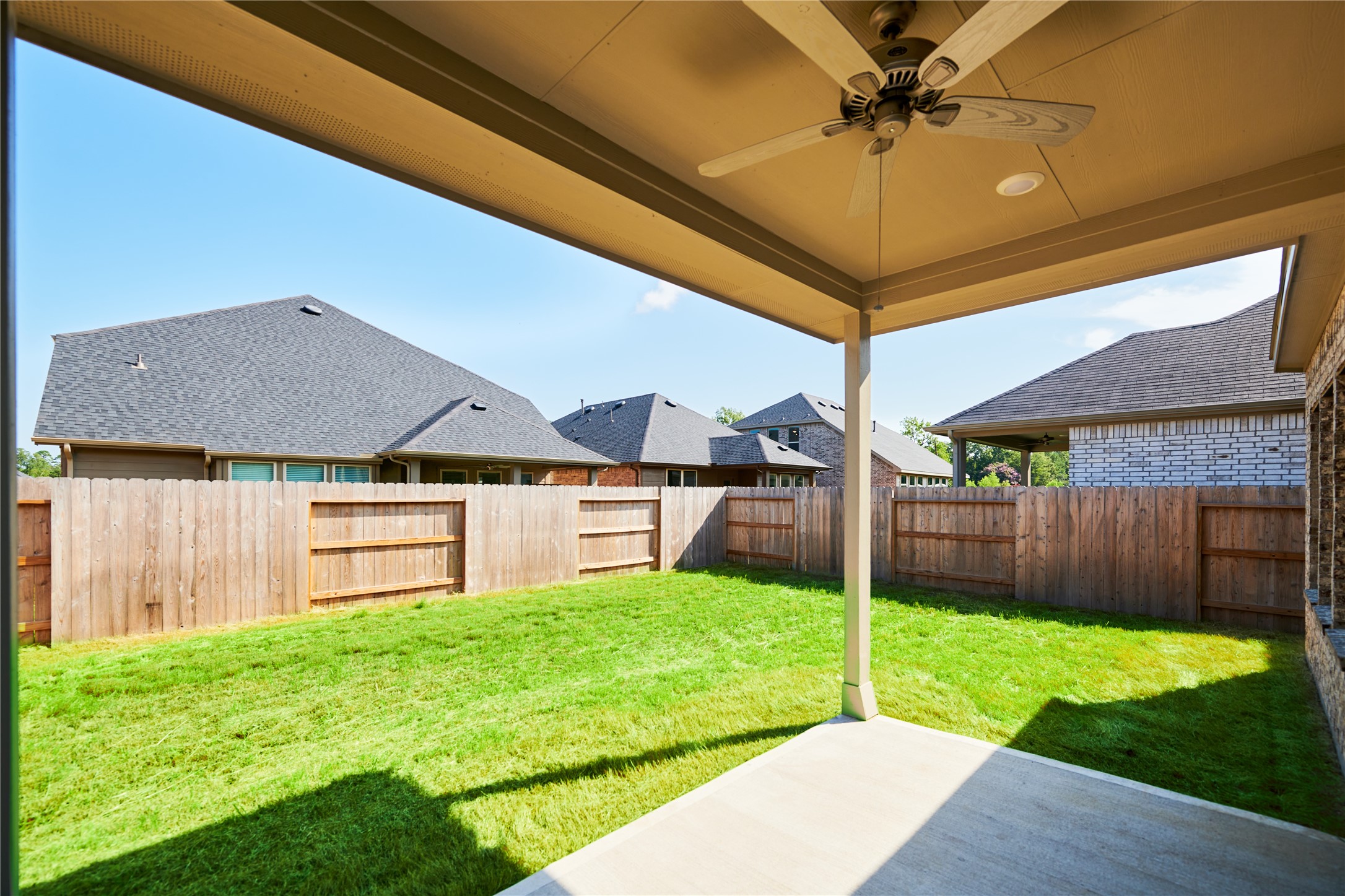 10647 Whitejacket Conroe, TX 77385 - Photo 4 of 38 a view of a backyard with a garden