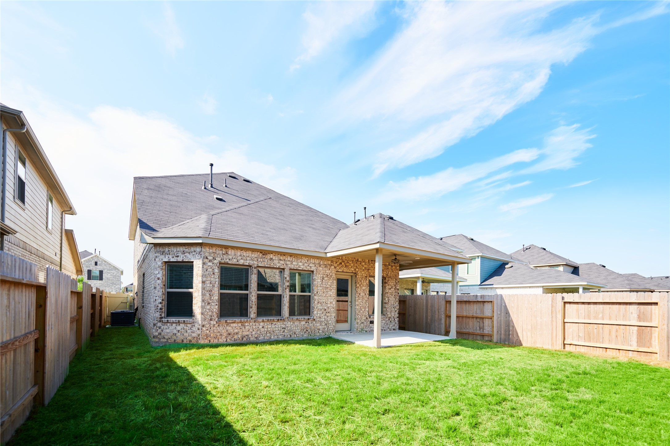10647 Whitejacket Conroe, TX 77385 - Photo 6 of 38 a view of a house with a big yard and large trees
