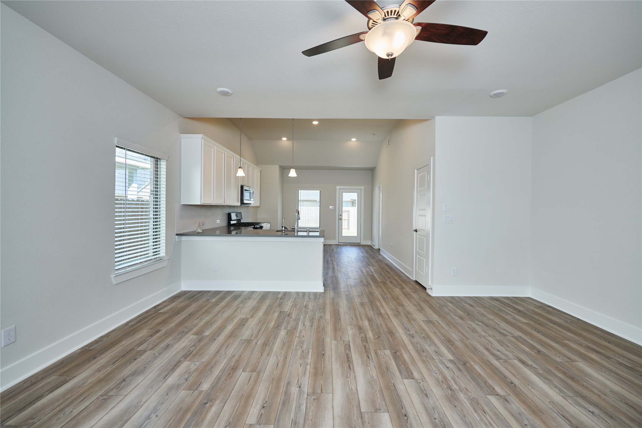 10647 Whitejacket Conroe, TX 77385 - Photo 7 of 38 a view of an empty room and window