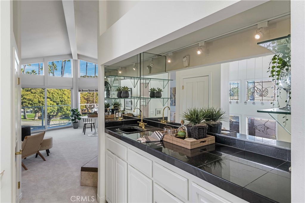 6090 Appian Way Long Beach, CA 90803 - Photo 13 of 41 a living room with furniture and a large window