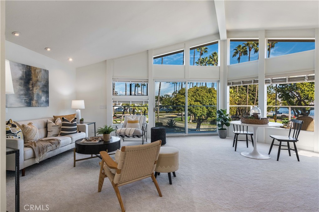 6090 Appian Way Long Beach, CA 90803 - Photo 15 of 41 a living room with furniture and a large window