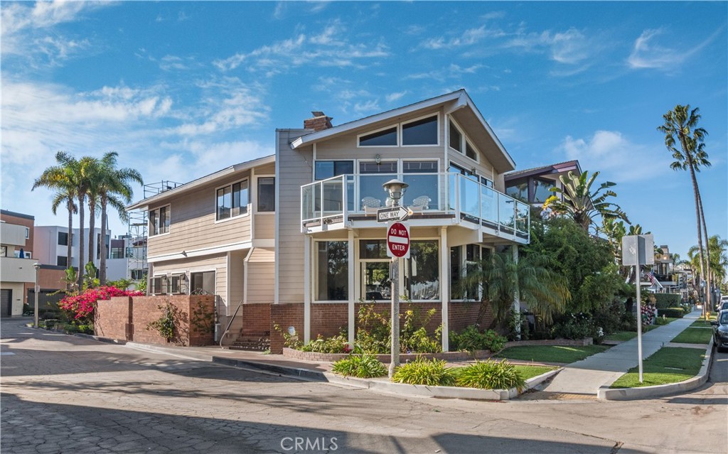 6090 Appian Way Long Beach, CA 90803 - Photo 2 of 41 a view of a house with a yard