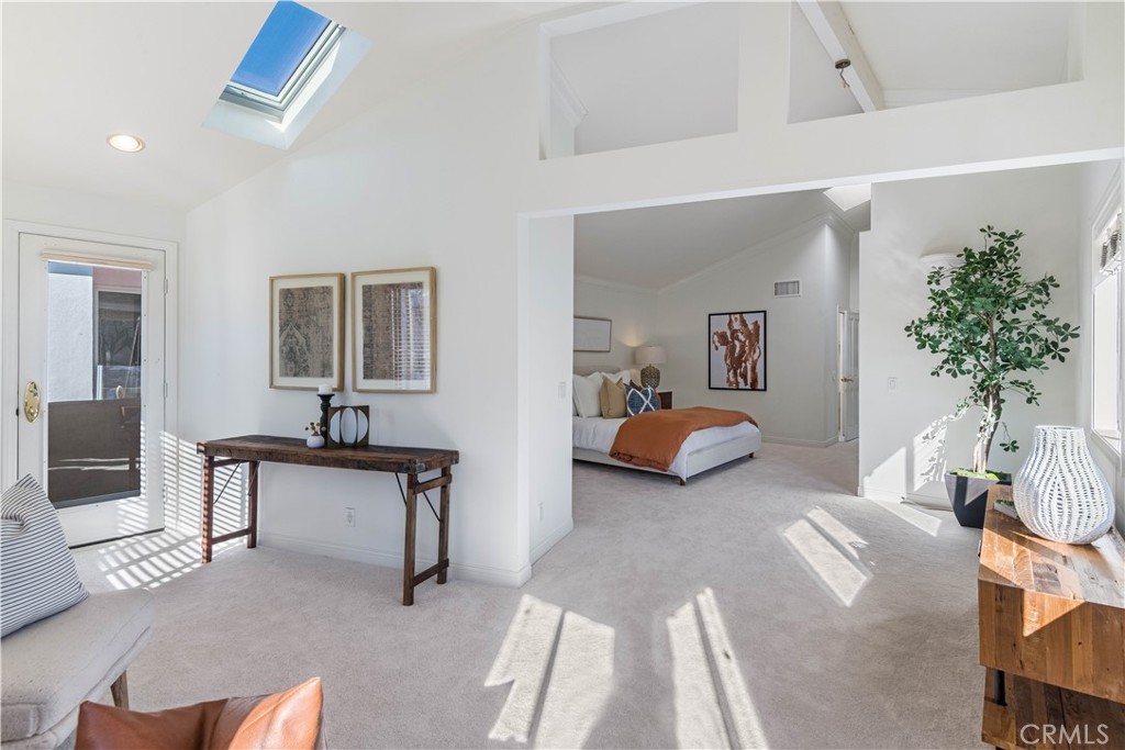 6090 Appian Way Long Beach, CA 90803 - Photo 21 of 41 a living room with furniture and a potted plant