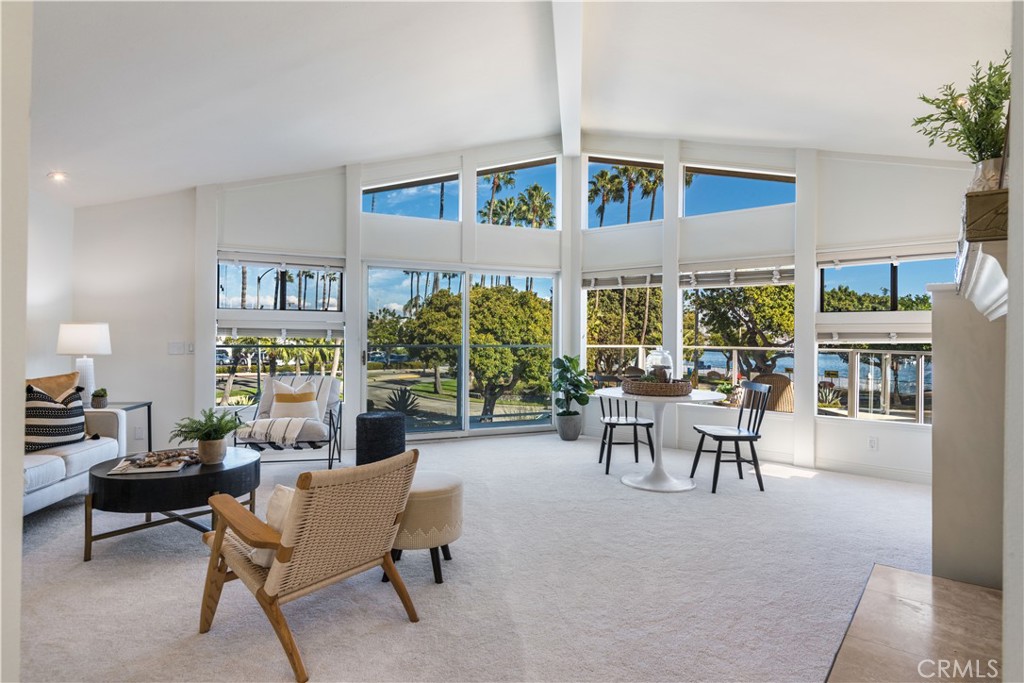 6090 Appian Way Long Beach, CA 90803 - Photo 3 of 41 a living room with furniture and a large window