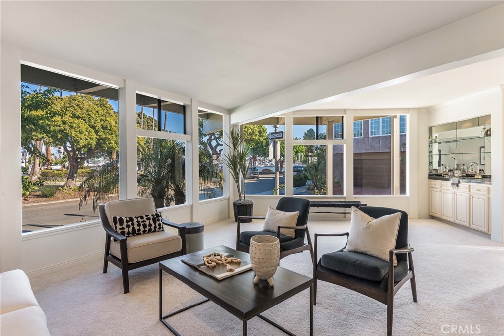 6090 Appian Way Long Beach, CA 90803 - Photo 5 of 41 a living room with furniture and a large window