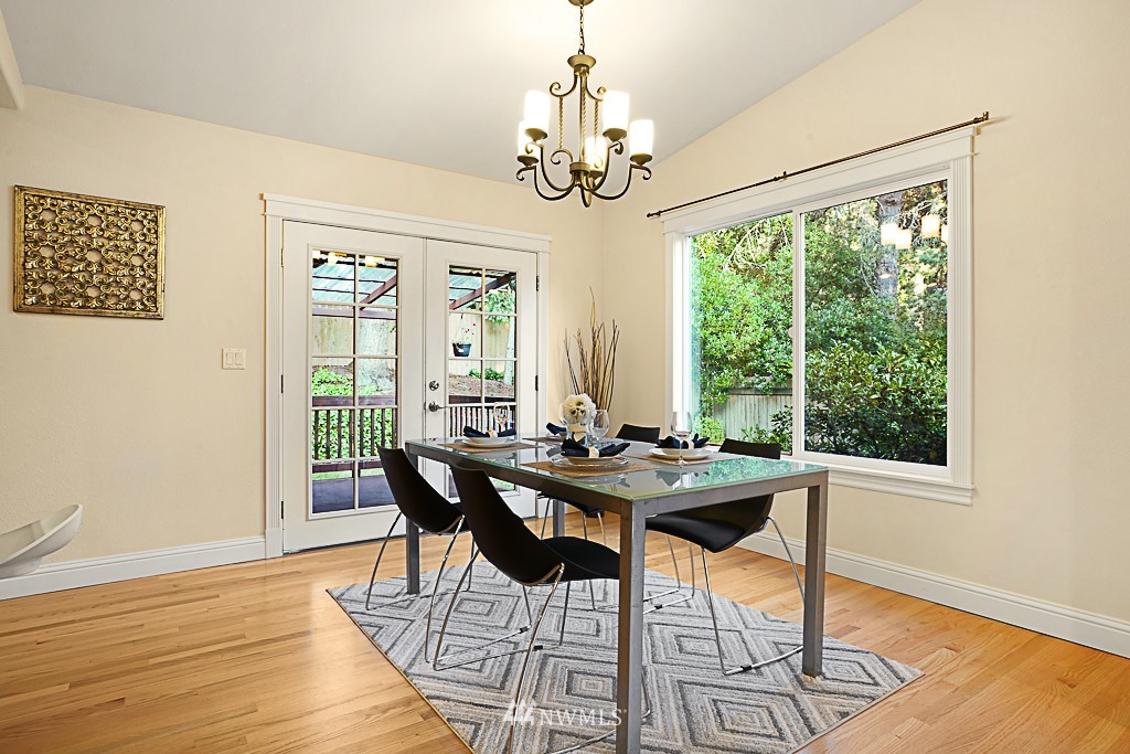 2806 183rd Avenue Northeast Redmond, WA 98052 - Photo 12 of 40 a view of a dining room with furniture window and wooden floor