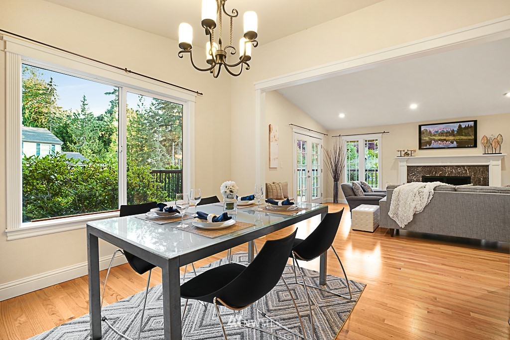 2806 183rd Avenue Northeast Redmond, WA 98052 - Photo 14 of 40 a view of a dining room with furniture window and wooden floor