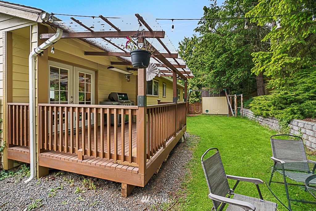 2806 183rd Avenue Northeast Redmond, WA 98052 - Photo 35 of 40 a view of a chair and table in the backyard