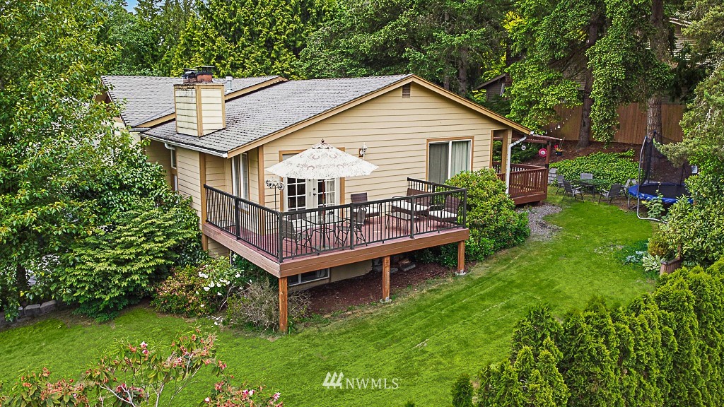 2806 183rd Avenue Northeast Redmond, WA 98052 - Photo 36 of 40 a view of a house with a yard and deck area
