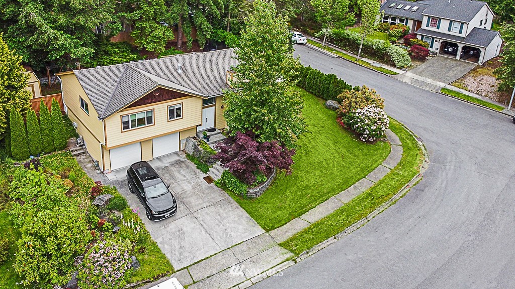 2806 183rd Avenue Northeast Redmond, WA 98052 - Photo 6 of 40 an aerial view of a house with garden