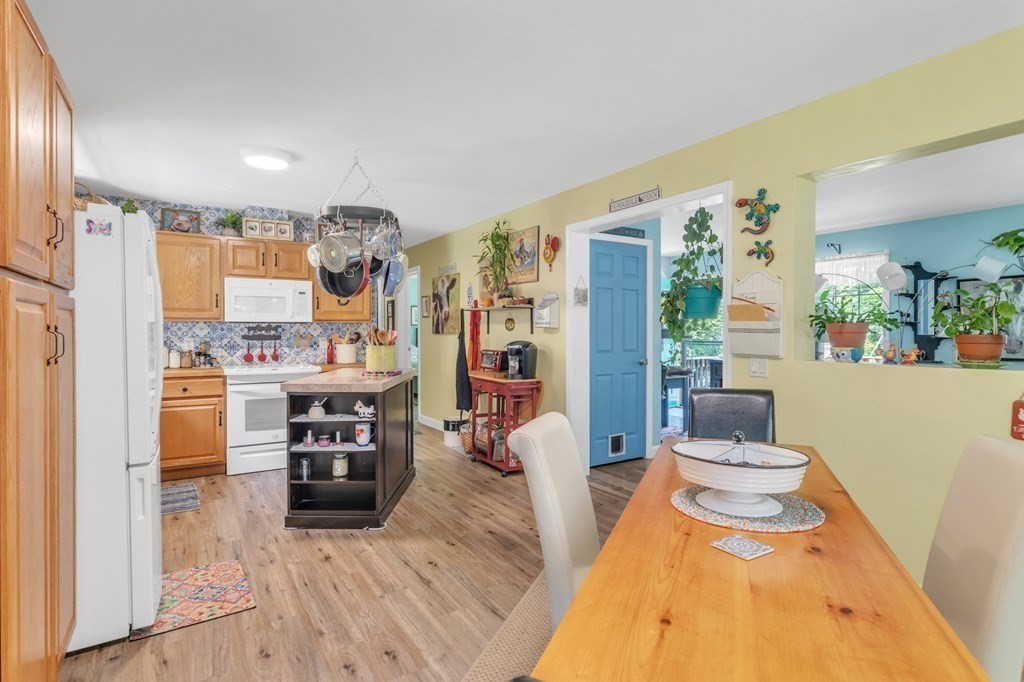 359 March Road Ashfield, MA 01370 - Photo 11 of 34 a living room with stainless steel appliances kitchen island granite countertop furniture and a view of kitchen