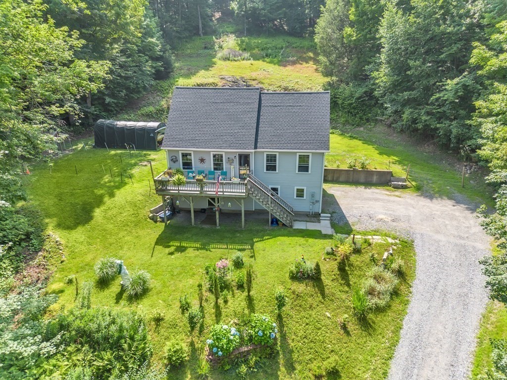 359 March Road Ashfield, MA 01370 - Photo 2 of 34 a aerial view of a house with swimming pool garden and patio