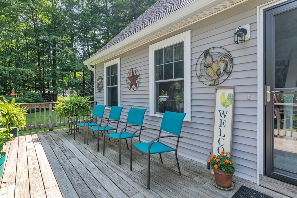 359 March Road Ashfield, MA 01370 - Photo 5 of 34 a view of balcony with two chairs and a potted plant