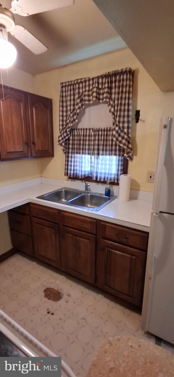 202 Holy Cross Road Brooklyn, MD 21225 - Photo 11 of 18 Cozy kitchen with classic charm.
